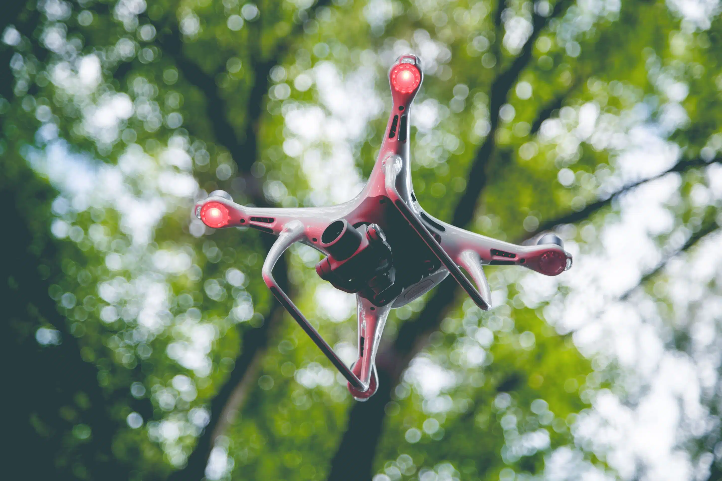 drone with camera flying on green nature backgroun 2023 11 27 05 24 48 utc 1 scaled